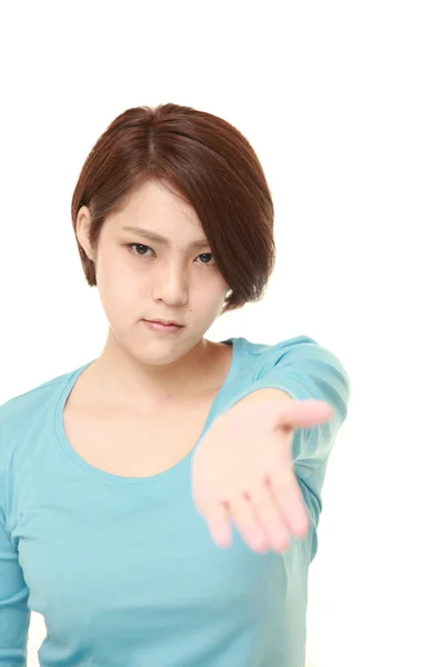 Angry young Japanese woman requests something — Stock Photo, Image