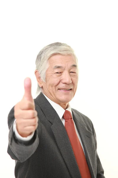 Senior Japanse zakenman met duimen omhoog gebaar — Stockfoto