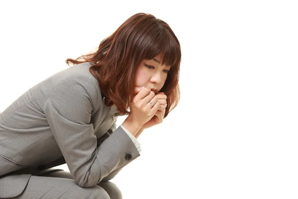 Jeune femme d'affaires japonaise déprimée — Photo