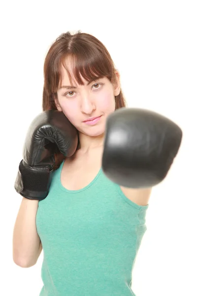 Boxeador femenino lanzando un jab izquierdo —  Fotos de Stock