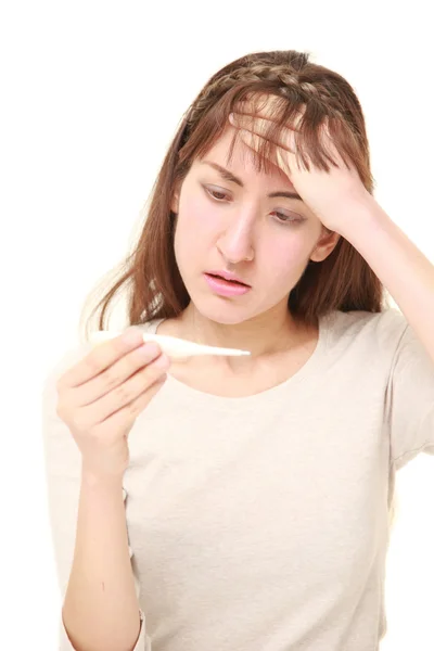 Young woman with fever — Stock Photo, Image