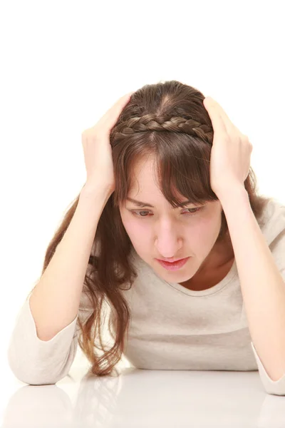 Portrait of perplexed woman — Stock Photo, Image