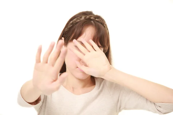 Young woman making stop gesture — Stock Photo, Image