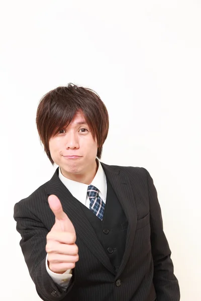 Japanese businessman with thumbs up gesture — Stock Photo, Image