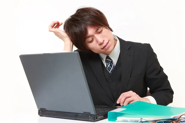 Businessman suffers from headache — Stock Photo, Image