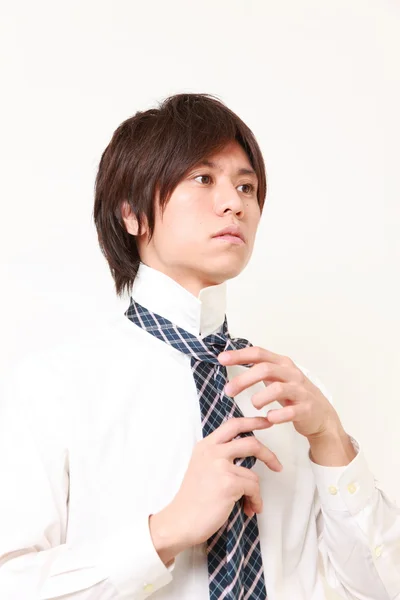 Businessman getting dressed for office — Stock Photo, Image