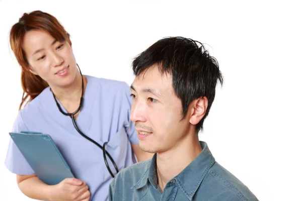 Nurse Talks To Her Patient — Stock Photo, Image