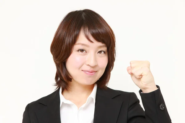 Японская предпринимательница в победной позе — стоковое фото