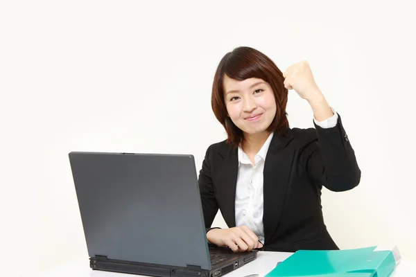 Japanese businesswoman in a victory pose — Stock Photo, Image