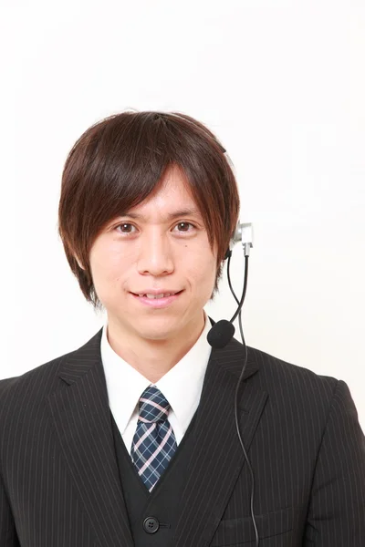 Joven empresario japonés de call center —  Fotos de Stock