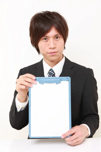 Businessman with message board — Stock Photo, Image