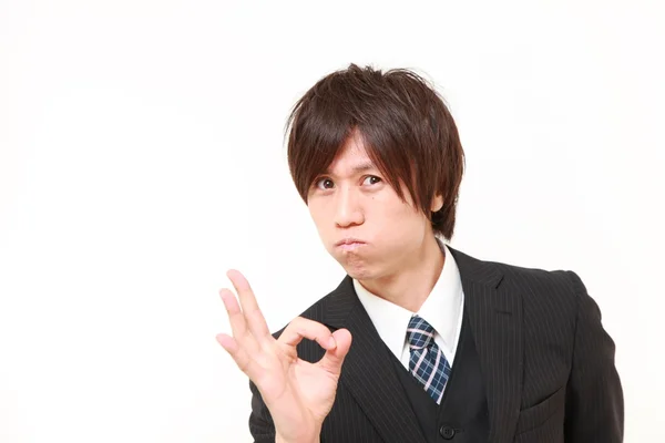 Young Japanese Business man showing perfect sign — Stock Photo, Image