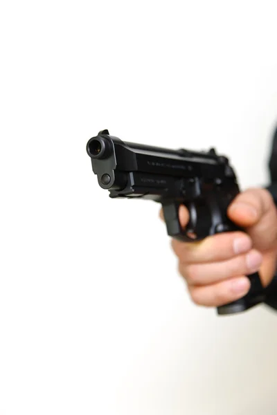 Man with a handgun — Stock Photo, Image