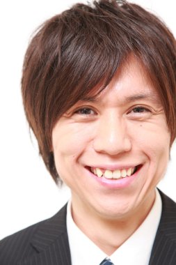 Japon işadamı gülümsüyor