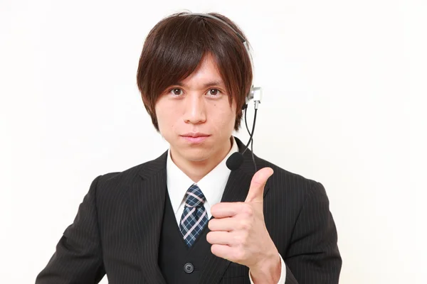 Joven empresario japonés de call center —  Fotos de Stock