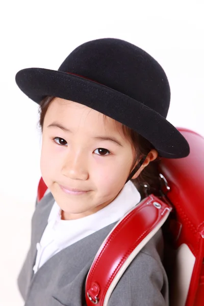 Japonesa escolar con rojo Satchel sonrisas — Foto de Stock