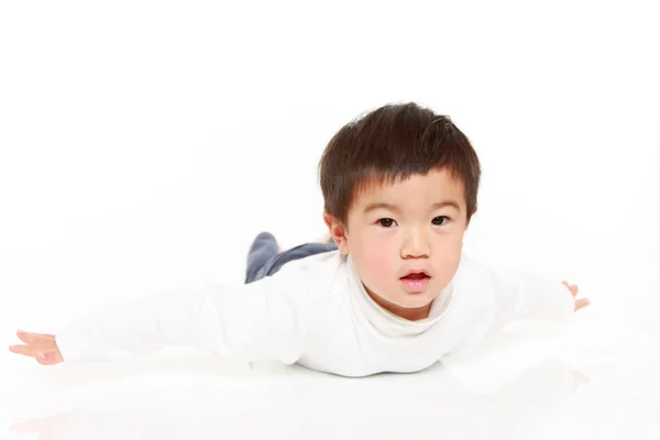 Japonés chico jugando avión —  Fotos de Stock