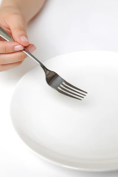 Fork with empty dish — Stock Photo, Image