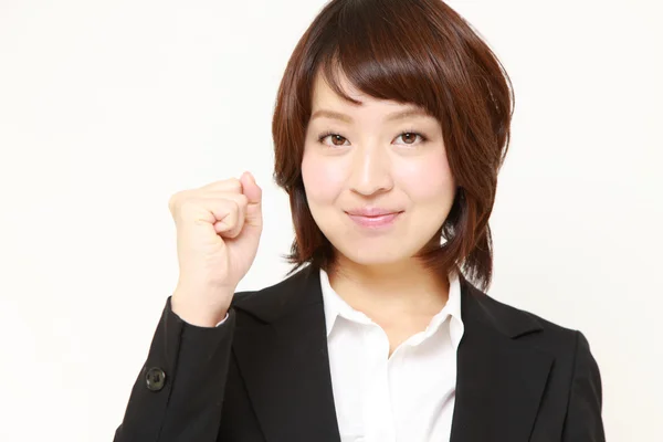 Japonské podnikatelka v póze vítězství — Stock fotografie