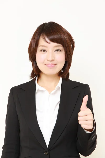 Japonesa mujer de negocios con los pulgares hacia arriba gesto —  Fotos de Stock