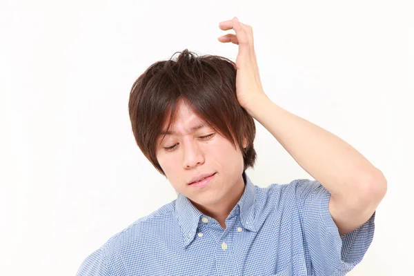 Man suffers from headache — Stock Photo, Image