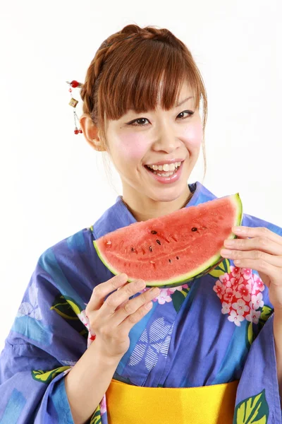 Young woman wearing Japanese kimono with watermelon — Stock Photo, Image