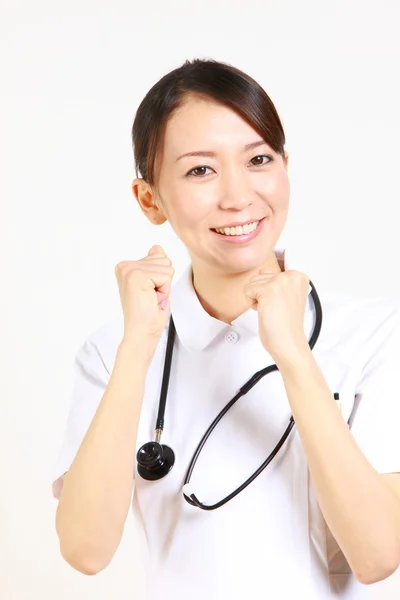 Enthusiastic young Japanese nurse — Stock Photo, Image