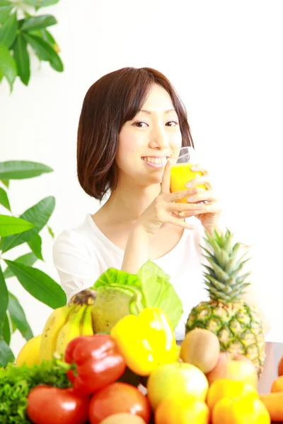 Young Woman drinks juice — Stock Photo, Image