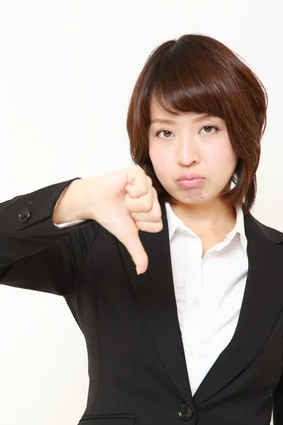 Bizneswoman z kciuk w dół gest — Zdjęcie stockowe
