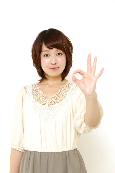 Japanese woman showing perfect sign — Stock Photo, Image