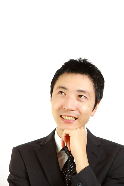 Japanischer Geschäftsmann träumt von seiner Zukunft — Stockfoto