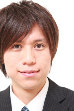 Japon işadamı gülümsüyor