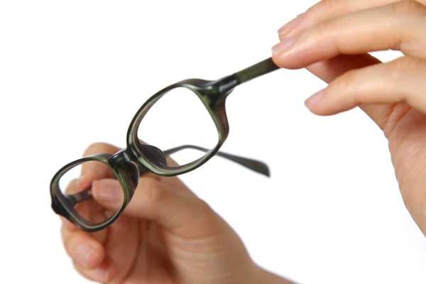 Hand with glasses — Stock Photo, Image