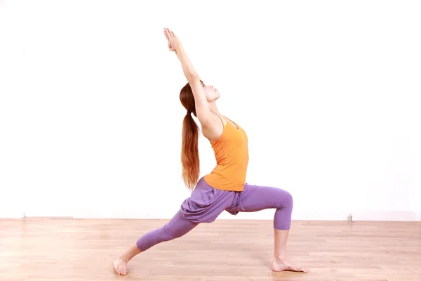 Young Japanese Woman Doing YOGA warrior 1 pose — Stock Photo, Image