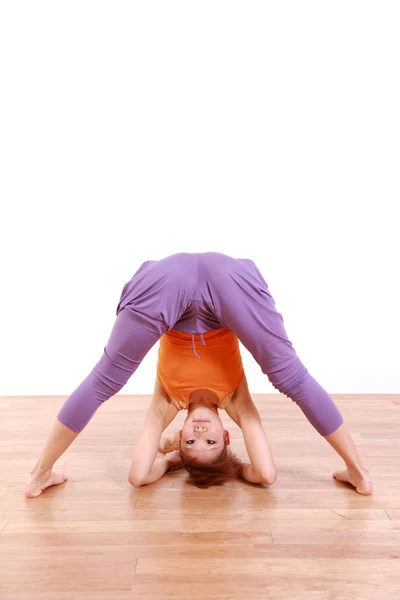 Young Japanese Woman Doing YOGA wide legged forward bend pose — Stock Photo, Image