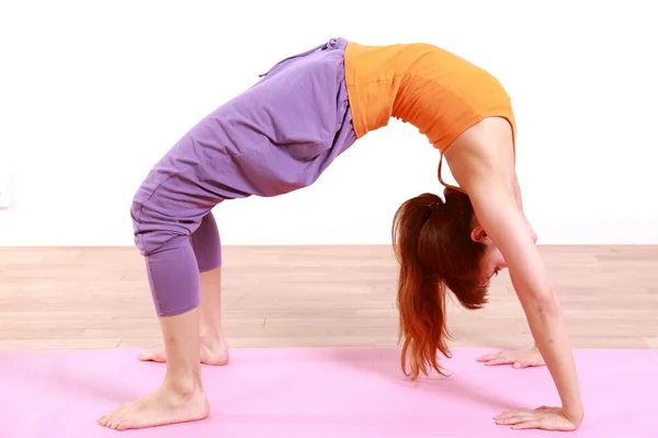 Young Japanese woman doing YOGA — Stock Photo, Image