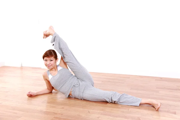 Japanese woman doing Stretch — Stock Photo, Image