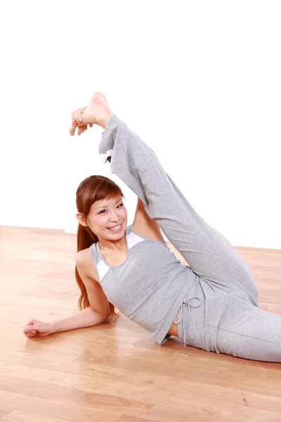 Japanese woman doing Stretch — Stock Photo, Image