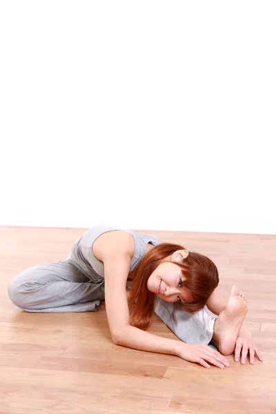 Japanese woman doing Stretch — Stock Photo, Image