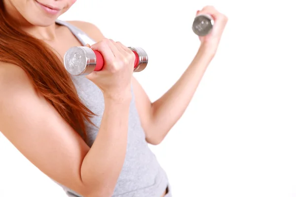 Jovem mulher fazendo dumbbell exercício — Fotografia de Stock