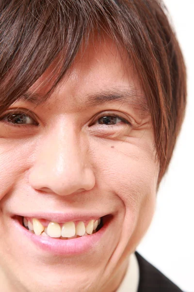 Uomo d'affari giapponese sorride — Foto Stock