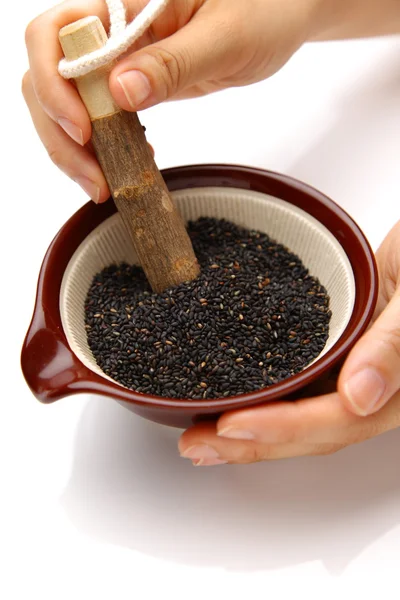 Grinding Black sesame seed — Stock Photo, Image