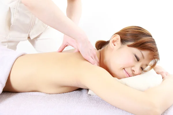 Woman getting a back massage — Stock Photo, Image