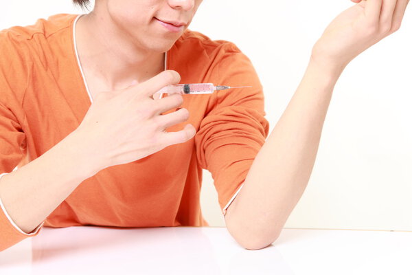 Drug Addict Injecting