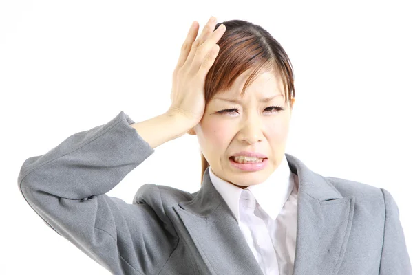 Perplexed businesswoman — Stock Photo, Image