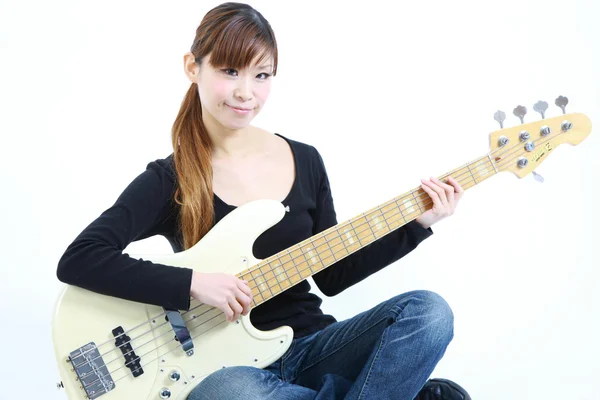 Young Japanese woman with white 5strings bass — Stock Photo, Image