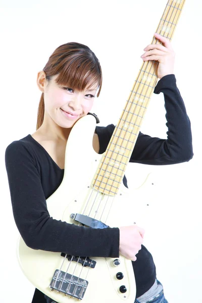 Young Japanese woman with white 5strings bass — Stock Photo, Image