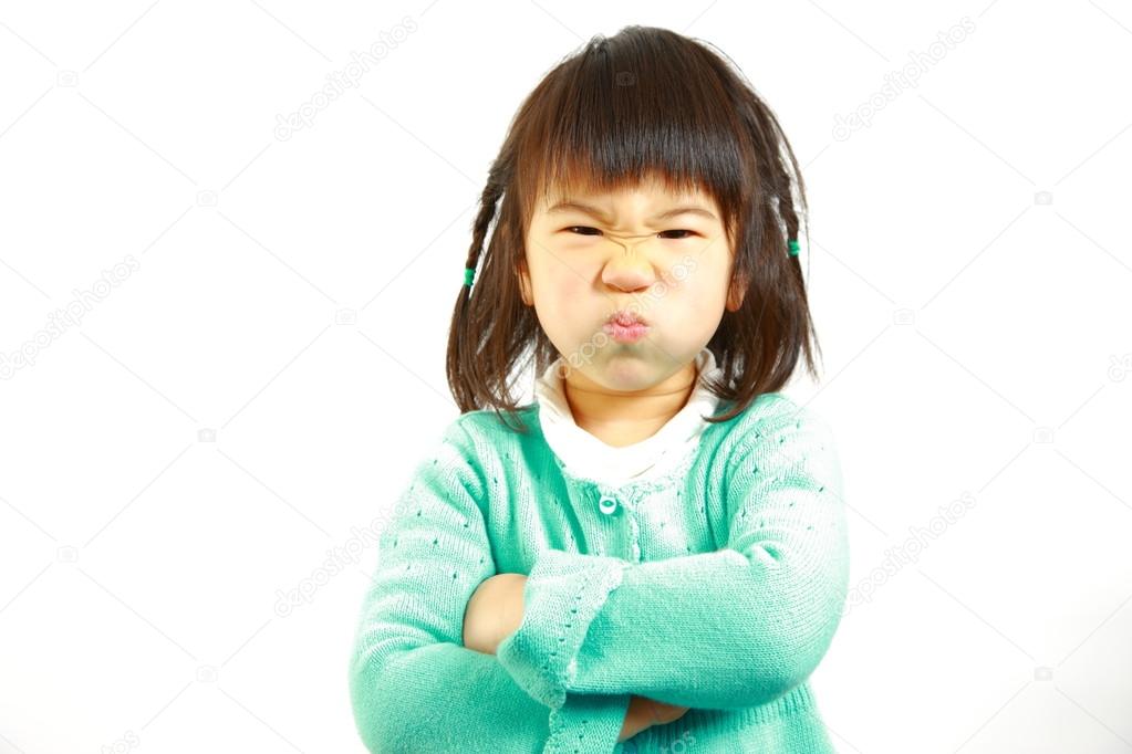 Bad mood Japanese little girl