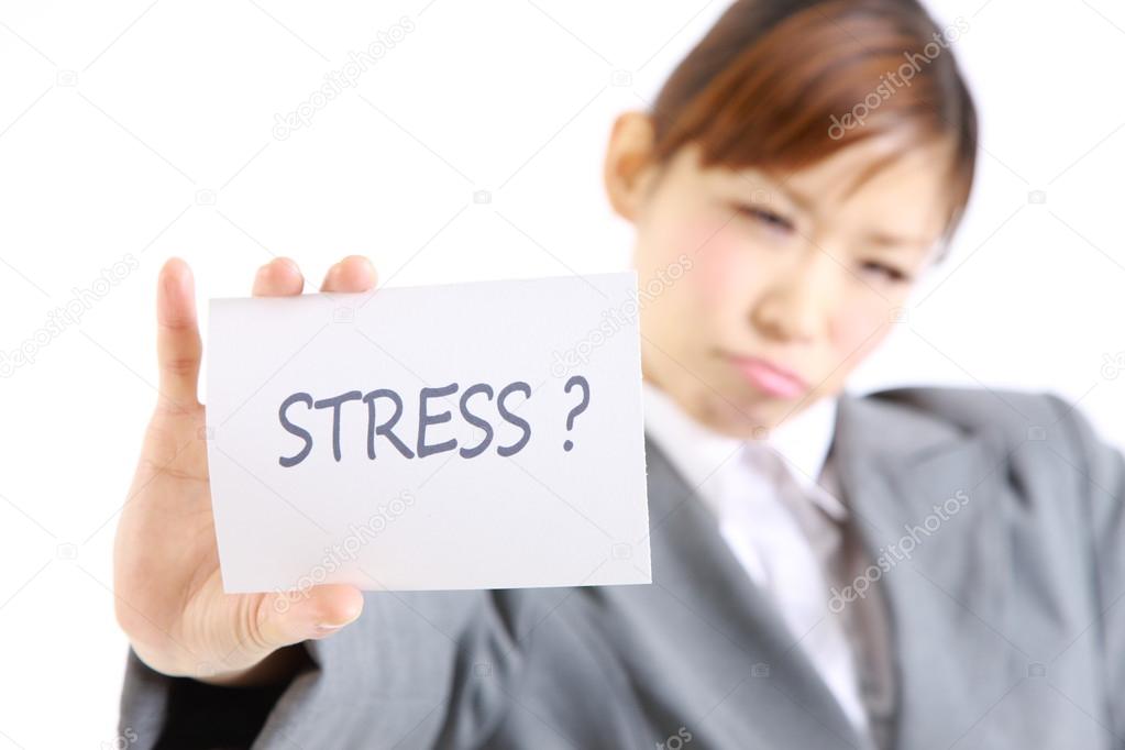 Businesswoman showing a card with word  STRESS?