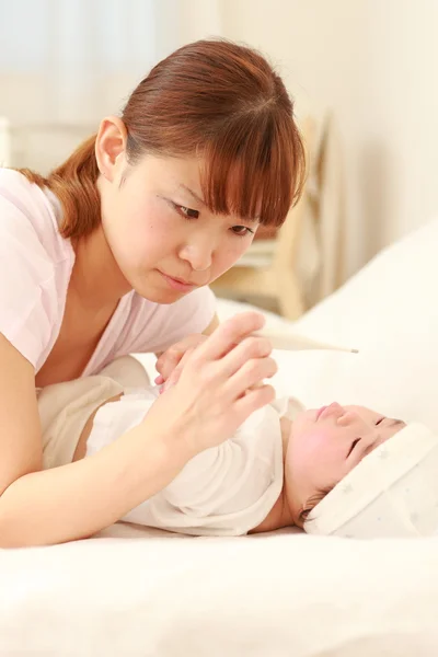 Baby with fever — Stock Photo, Image